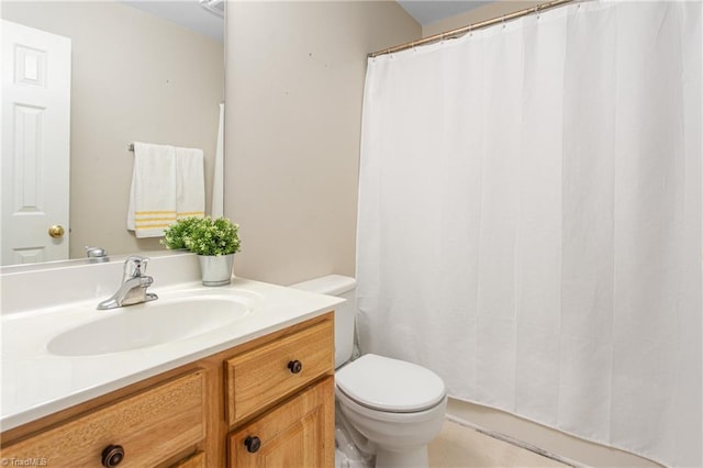 bathroom with a shower with shower curtain, toilet, and vanity