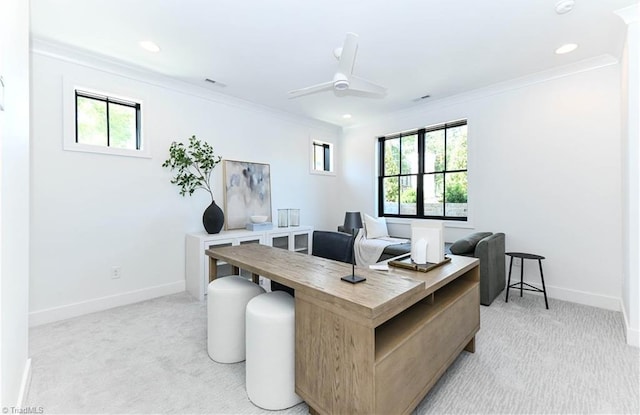 office area with crown molding, light colored carpet, and a wealth of natural light