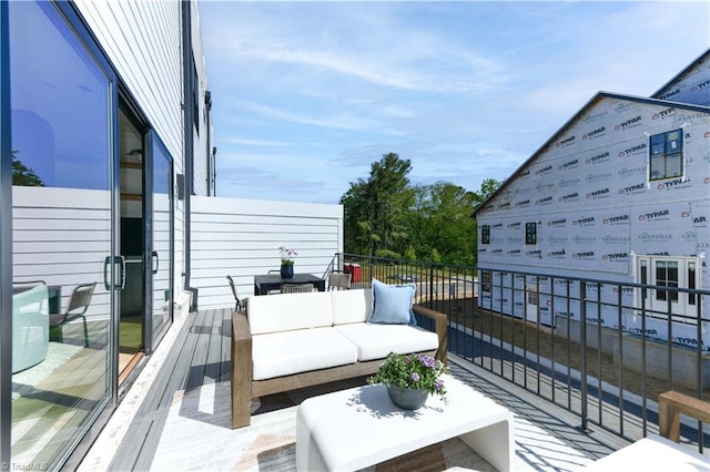 balcony with an outdoor hangout area