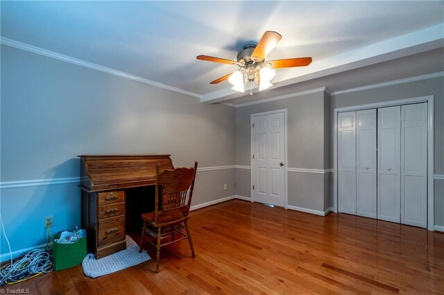 unfurnished bedroom with wood-type flooring, a closet, ceiling fan, and lofted ceiling