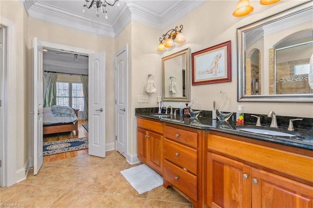 bathroom featuring vanity, tile patterned flooring, ornamental molding, walk in shower, and a notable chandelier