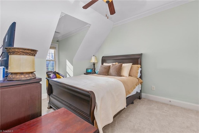 carpeted bedroom featuring ceiling fan and crown molding