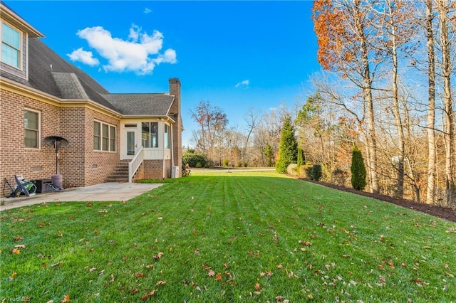 view of yard with a patio area