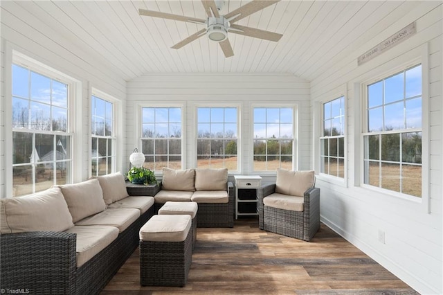 sunroom / solarium featuring ceiling fan, lofted ceiling, plenty of natural light, and wooden ceiling