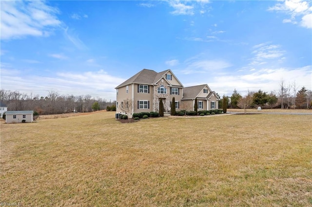 view of front of home featuring a front lawn