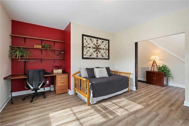 bedroom featuring light hardwood / wood-style flooring