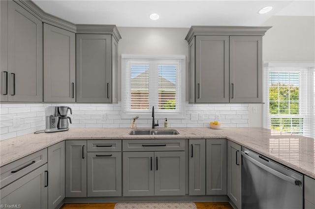 153 Montauk Ct, Clemmons, NC 27012 - kitchen with stainless steel dishwasher, gray cabinets, decorative backsplash, light stone counters, and recessed lighting