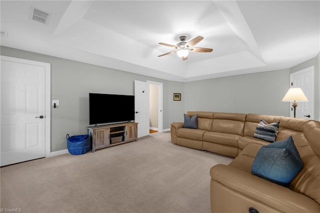 153 Montauk Ct, Clemmons, NC 27012 - living area featuring a raised ceiling, a ceiling fan, and carpet flooring
