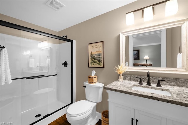 153 Montauk Ct, Clemmons, NC 27012 - bathroom featuring vanity, a shower stall, and wood finished floors