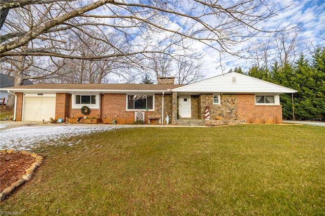 ranch-style house with a garage and a front lawn