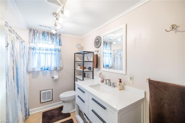 144 Collins Rd, Sparta, NC 28675 - bathroom featuring vanity, toilet, ornamental molding, and heating unit