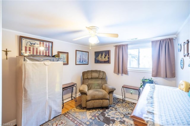 144 Collins Rd, Sparta, NC 28675 - bedroom featuring ceiling fan, light wood-type flooring, and crown molding