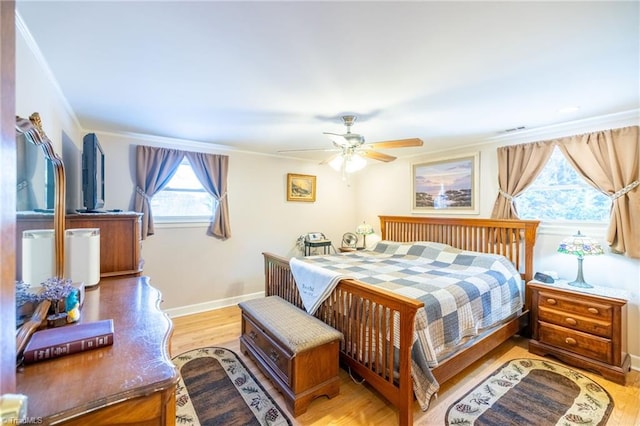 144 Collins Rd, Sparta, NC 28675 - bedroom featuring ceiling fan, crown molding, and light wood-type flooring