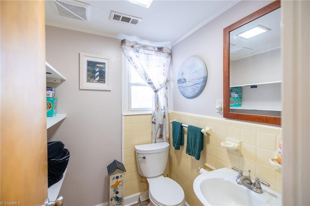 144 Collins Rd, Sparta, NC 28675 - bathroom with toilet, tile walls, crown molding, and sink