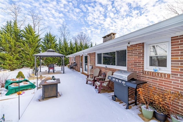 144 Collins Rd, Sparta, NC 28675 - snow covered patio featuring a gazebo and grilling area