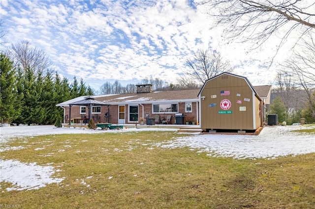 144 Collins Rd, Sparta, NC 28675 - view of front of home with an outbuilding, a gazebo, central AC, and a lawn