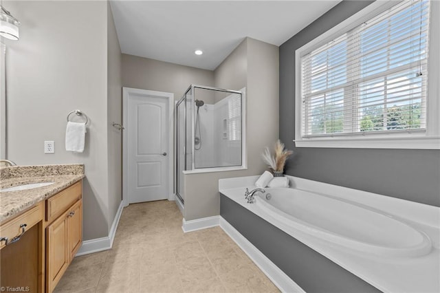 full bathroom with vanity, recessed lighting, baseboards, a shower stall, and a bath