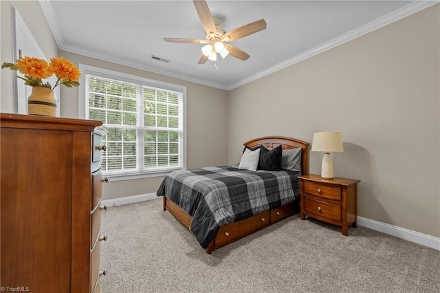 bedroom with visible vents, baseboards, crown molding, and light colored carpet