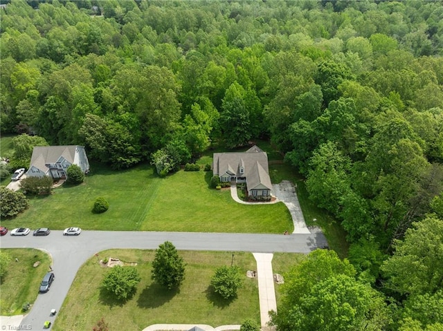 bird's eye view with a forest view