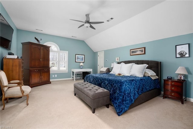 carpeted bedroom featuring vaulted ceiling and ceiling fan