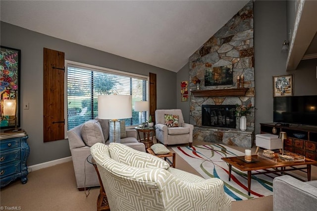 carpeted living room featuring a fireplace and high vaulted ceiling