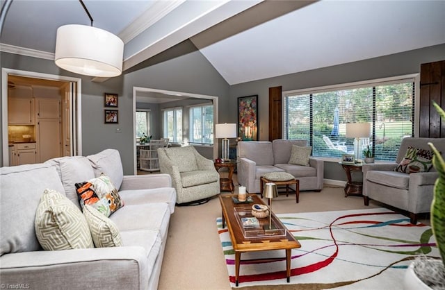 living room with crown molding, lofted ceiling, and light carpet