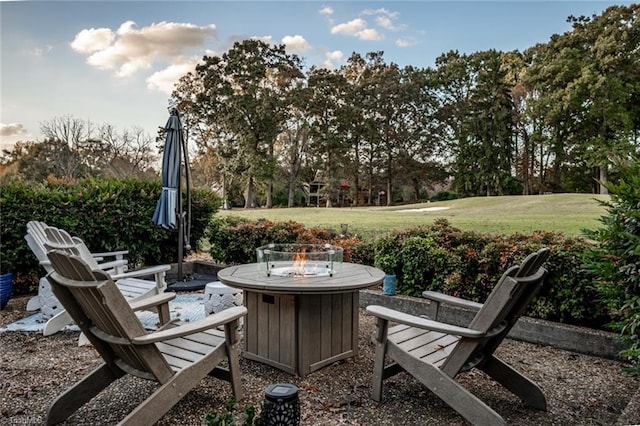 view of patio / terrace featuring a fire pit