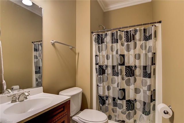 full bathroom featuring ornamental molding, toilet, vanity, and curtained shower