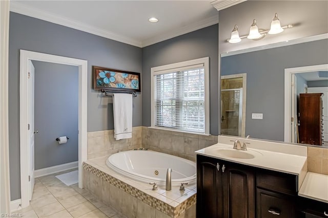 full bath featuring a stall shower, a jetted tub, vanity, ornamental molding, and baseboards