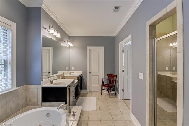 bathroom with a stall shower, a tub with jets, baseboards, double vanity, and crown molding