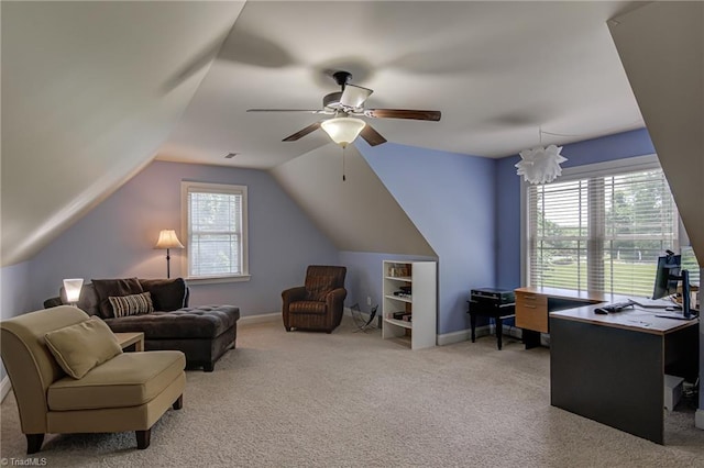 living room with carpet flooring, a ceiling fan, vaulted ceiling, an office area, and baseboards