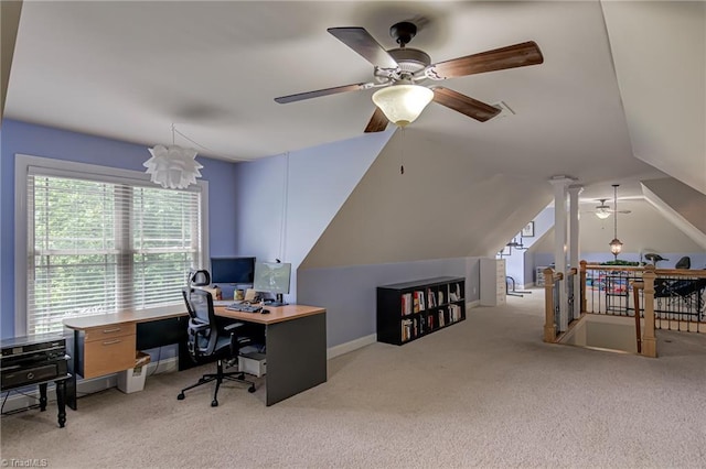 home office with a ceiling fan, carpet, and vaulted ceiling