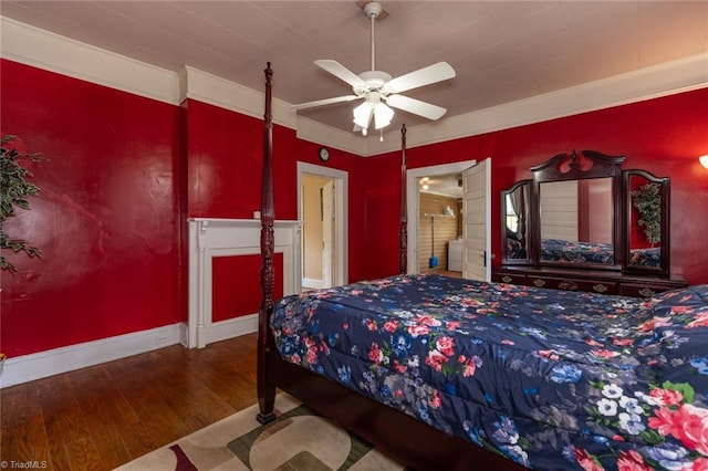bedroom with hardwood / wood-style flooring, ceiling fan, and baseboards