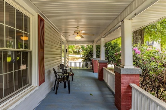 view of patio with a porch and a ceiling fan