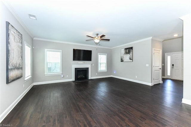 unfurnished living room featuring baseboards, a ceiling fan, dark wood finished floors, and crown molding