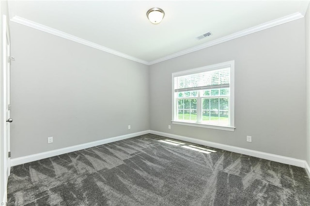 carpeted empty room with crown molding, baseboards, and visible vents