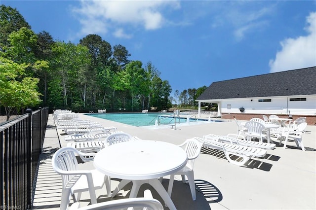 community pool featuring a patio