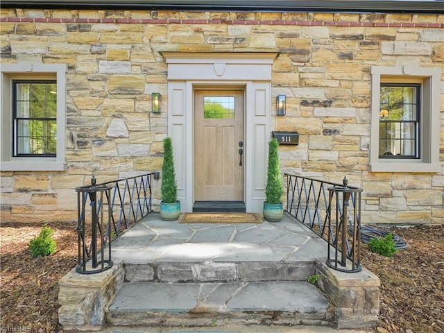 511 Circle Dr, Burlington, NC 27215 - doorway to property featuring stone siding