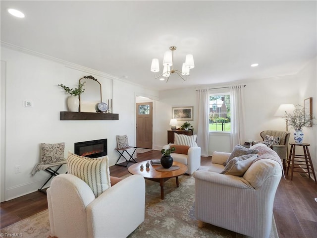 511 Circle Dr, Burlington, NC 27215 - living area featuring a chandelier, crown molding, wood finished floors, and a glass covered fireplace