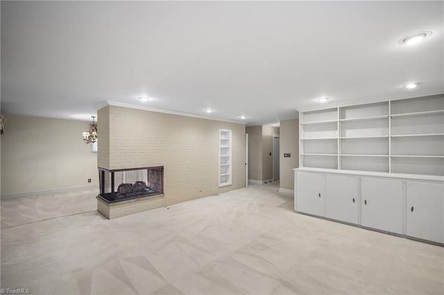 basement with a multi sided fireplace, light colored carpet, and built in features