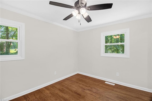 4126 Old Way Rd, Sophia, NC 27350 - unfurnished room featuring plenty of natural light, dark wood finished floors, crown molding, and a ceiling fan