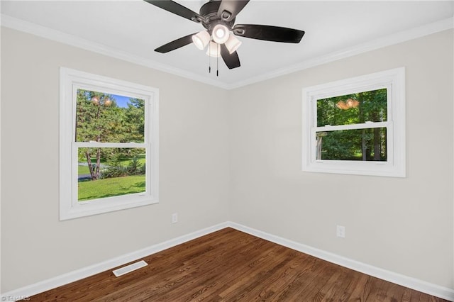 4126 Old Way Rd, Sophia, NC 27350 - spare room featuring healthy amount of natural light, dark wood-style flooring, crown molding, and a ceiling fan