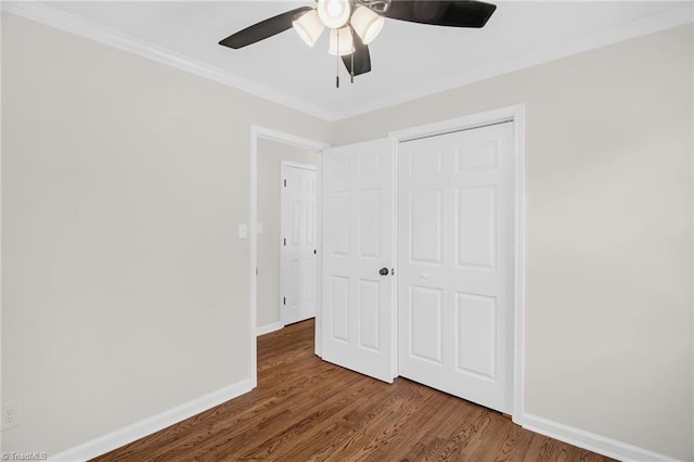 4126 Old Way Rd, Sophia, NC 27350 - unfurnished bedroom featuring wood finished floors, ornamental molding, ceiling fan, and a closet
