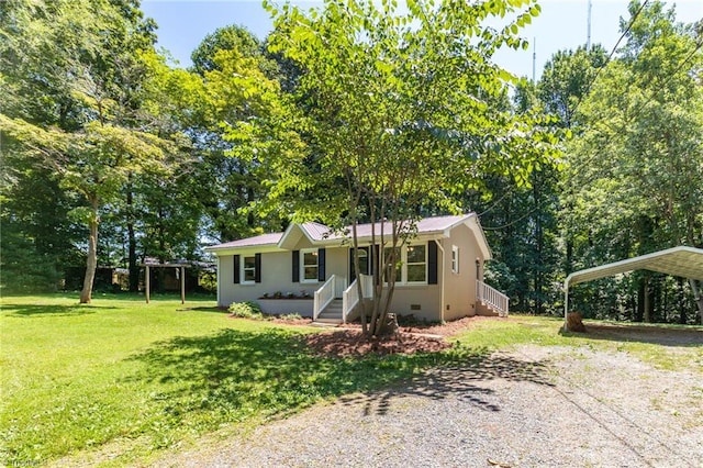 4126 Old Way Rd, Sophia, NC 27350 - view of front facade with driveway, a front lawn, a detached carport, and a metal roof