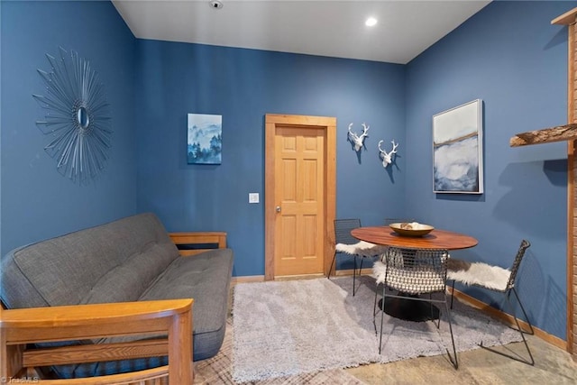 dining area with baseboards and recessed lighting