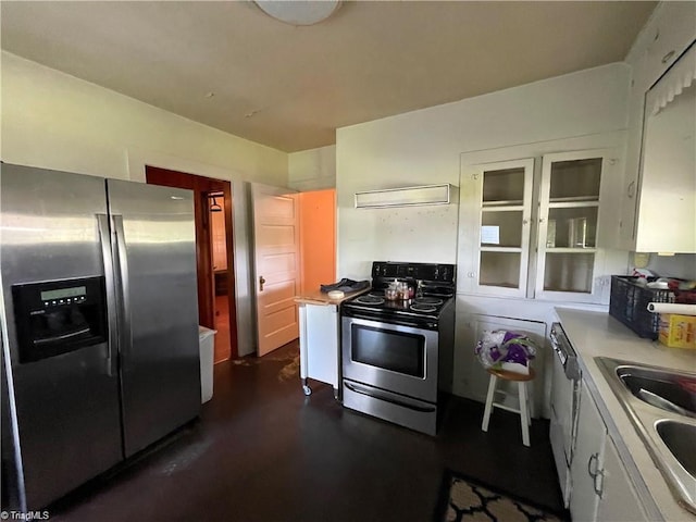 kitchen featuring white cabinetry, sink, and stainless steel appliances