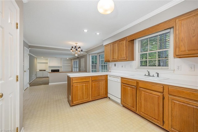 1808 Dunleith Way, Greensboro, NC 27455 - kitchen featuring white dishwasher, a sink, ornamental molding, a chandelier, and light countertops