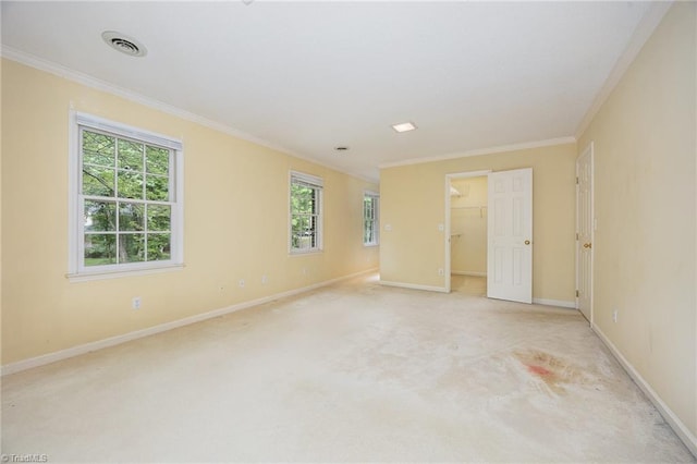 1808 Dunleith Way, Greensboro, NC 27455 - spare room featuring healthy amount of natural light, baseboards, ornamental molding, and light colored carpet