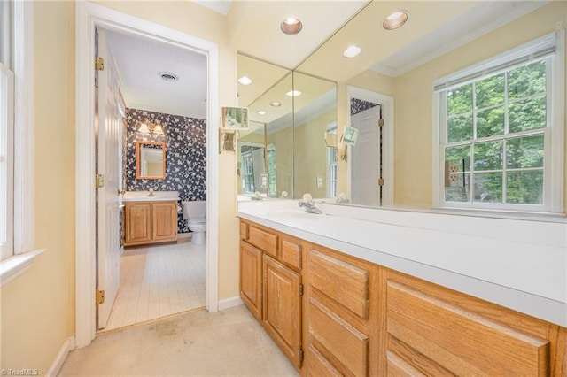 1808 Dunleith Way, Greensboro, NC 27455 - full bath featuring crown molding, vanity, recessed lighting, baseboards, and toilet