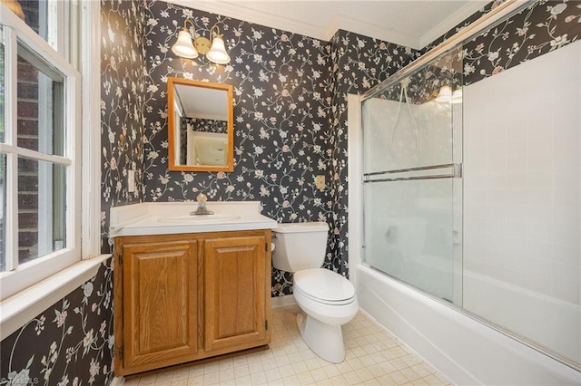 1808 Dunleith Way, Greensboro, NC 27455 - full bath featuring crown molding, toilet, vanity, wallpapered walls, and combined bath / shower with glass door